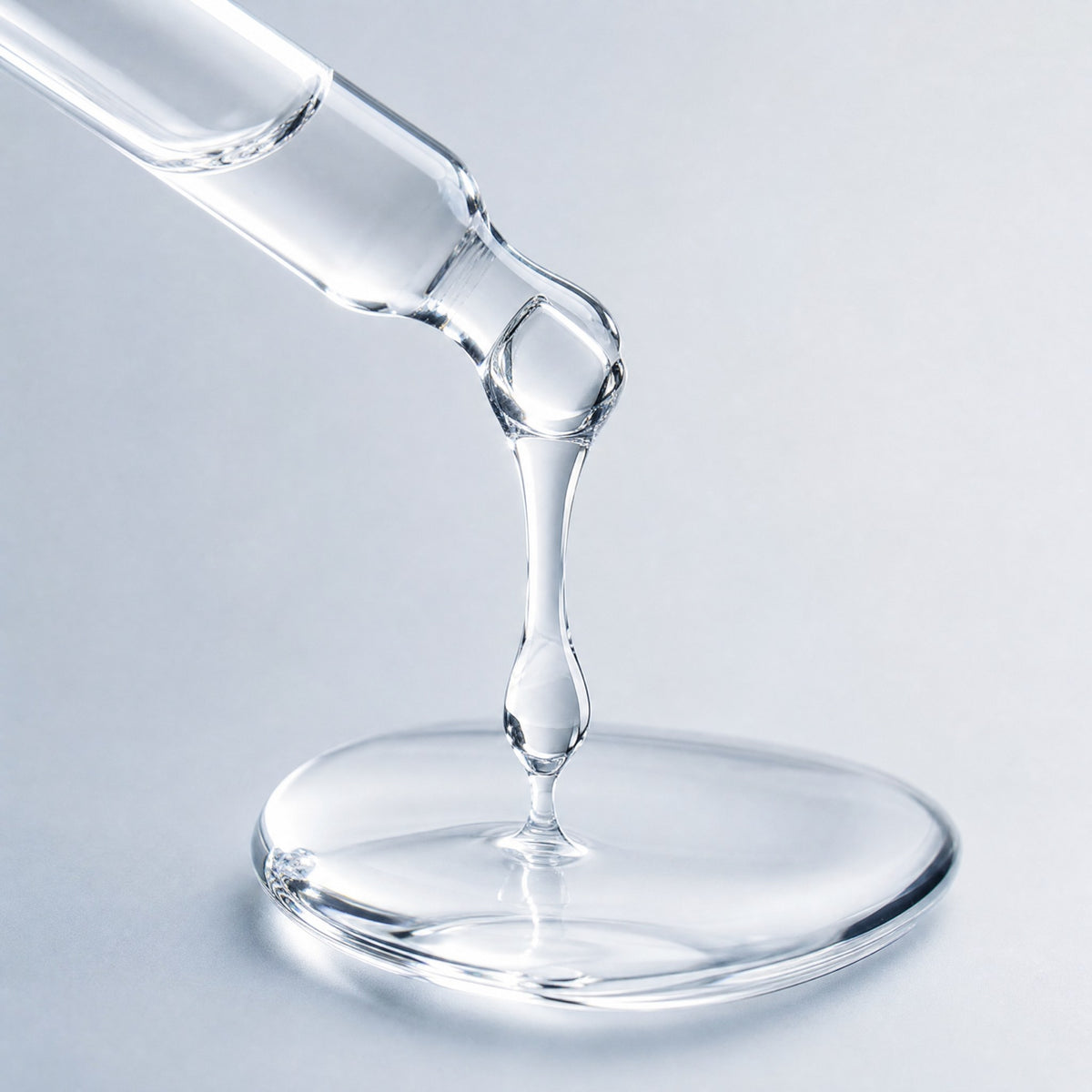 Skingenetix Acetyl Hexapeptide-8 Anti-Wrinkle Serum, 30ml - macro of the pipette tip with a clear drop of the serum