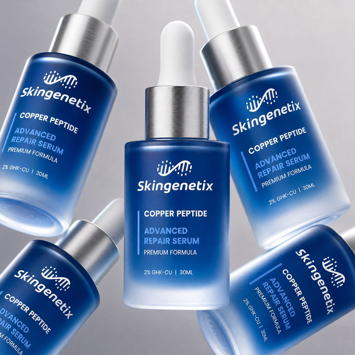 Skingenetix Copper Peptide (GHK-Cu) 2% Renewal Serum, 30ml - several bottles of the serum arranged in an angled group