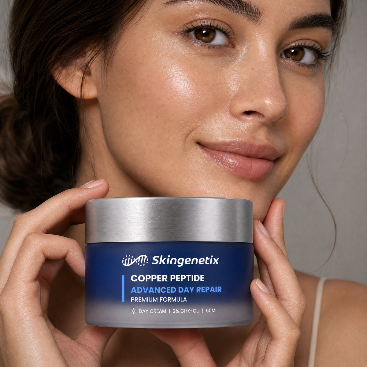 Skingenetix Copper Peptide (GHK-Cu) 2% Day Gel-Cream, 50ml - a model holding the jar beside their face