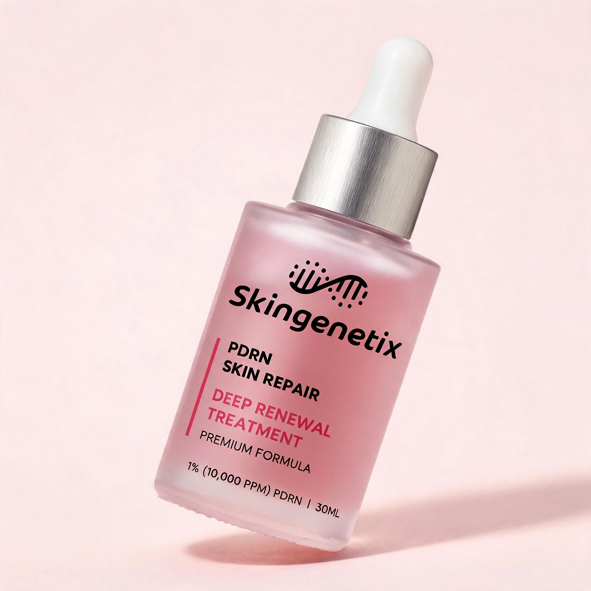 Skingenetix PDRN 1% Renewal Serum, 30ml - bottle on a soft blush colour-block ground