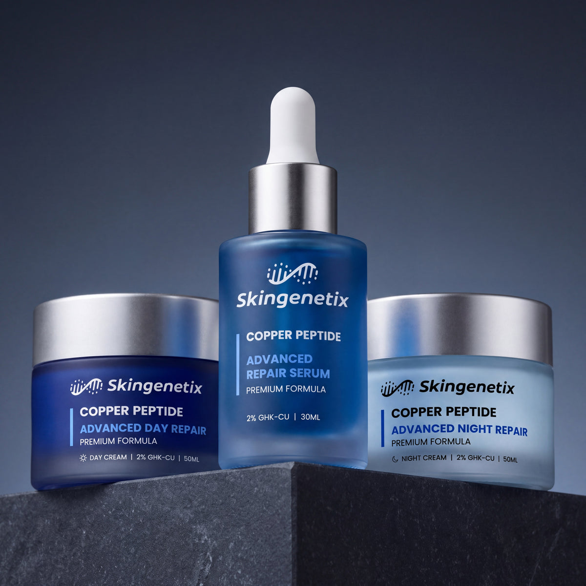 Skingenetix Complete Copper Peptide (GHK-Cu) Day & Night Skincare Routine - the three products grouped on a dark stone plinth