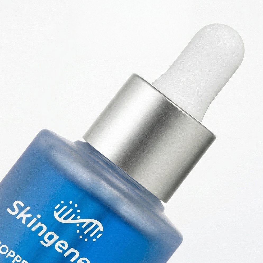 Skingenetix Copper Peptide (GHK-Cu) 2% Renewal Serum, 30ml - extreme close-up of the bottle shoulder and pipette collar