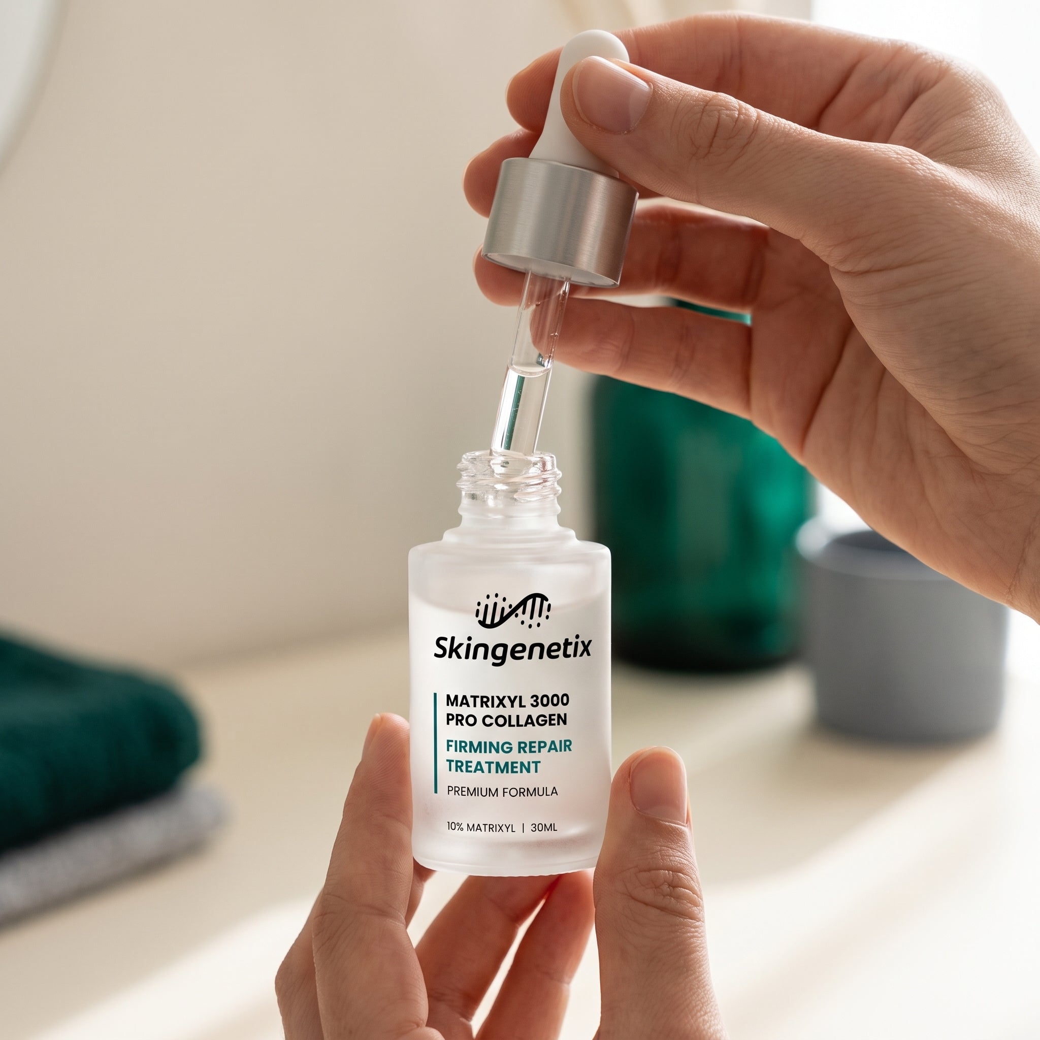 Two hands holding a 30ml frosted glass bottle of Skingenetix Matrixyl 3000 Firming Serum and lifting out the glass dropper