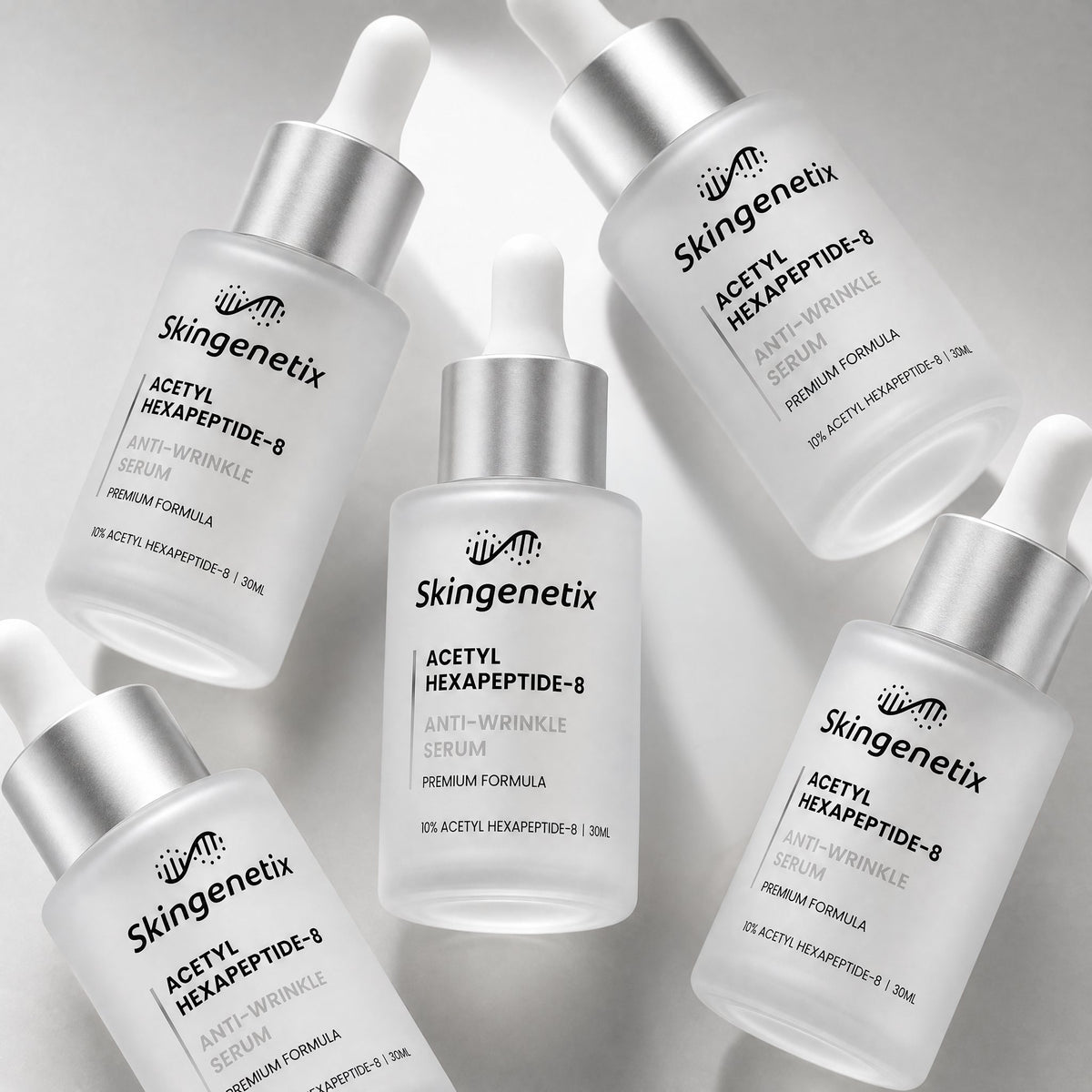 Skingenetix Acetyl Hexapeptide-8 Anti-Wrinkle Serum, 30ml - several bottles of the serum arranged in an angled group