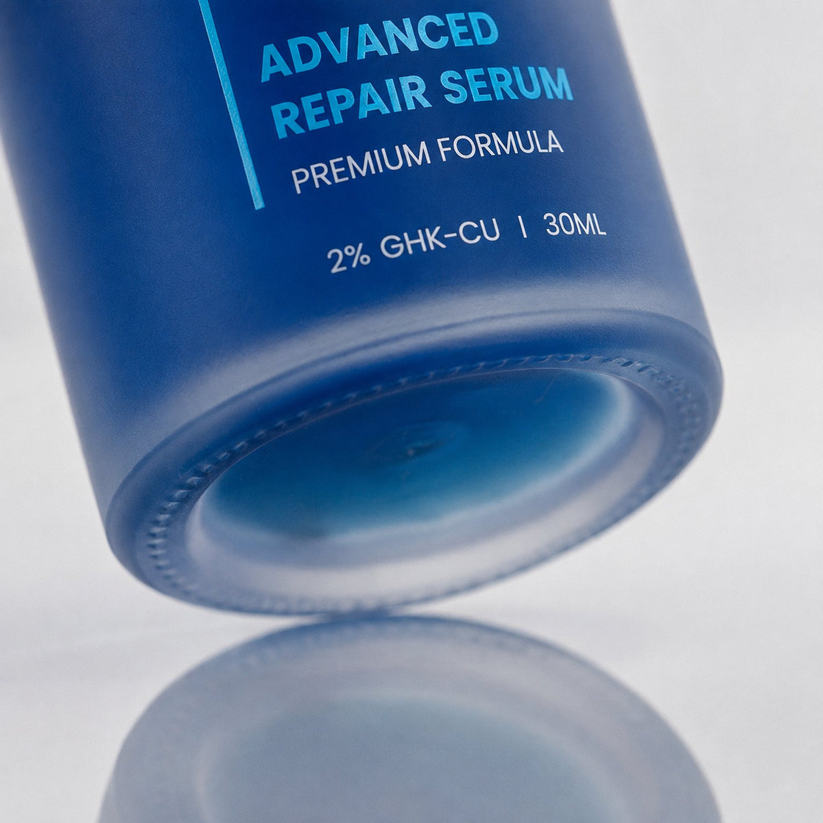 Skingenetix Copper Peptide (GHK-Cu) 2% Renewal Serum, 30ml - macro of the bottle base and its fine print