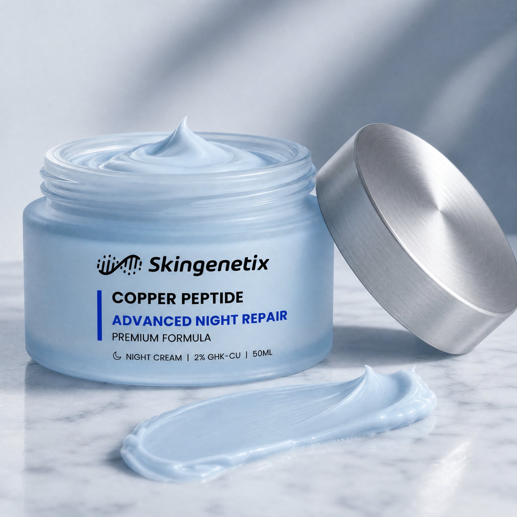 Skingenetix Copper Peptide (GHK-Cu) 2% Night Cream, 50ml - open jar with a swatch of the pale blue cream