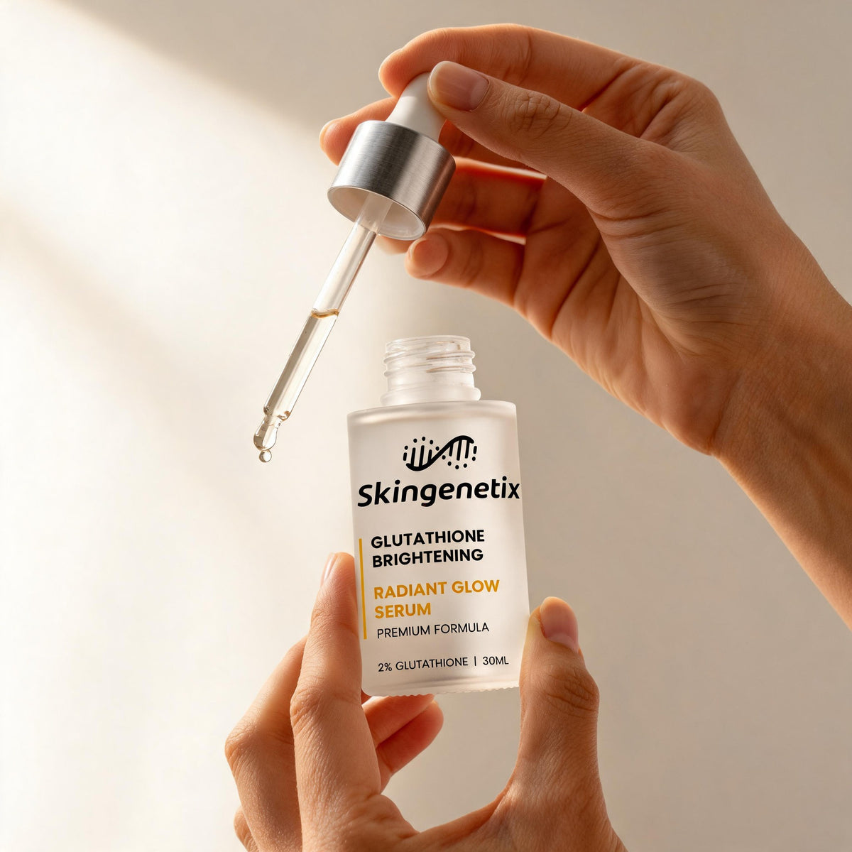 Skingenetix Glutathione Brightening Serum, 2% glutathione, 30ml - hands lifting the glass dropper from the bottle