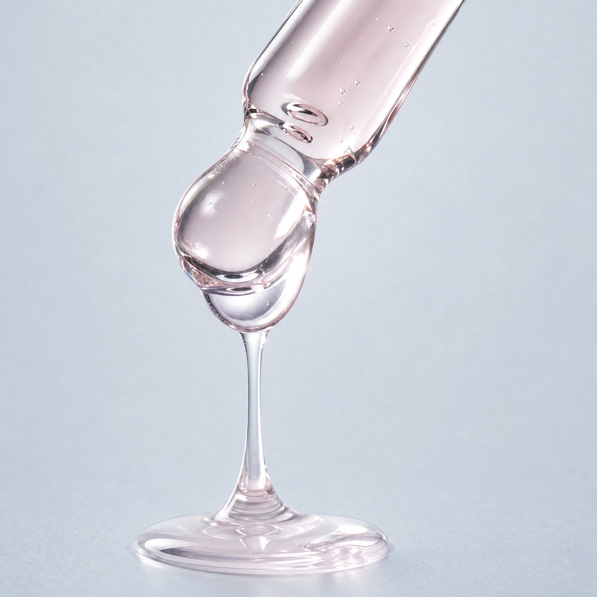 Skingenetix PDRN 1% Renewal Serum, 30ml - macro of the pipette tip with a drop of the serum