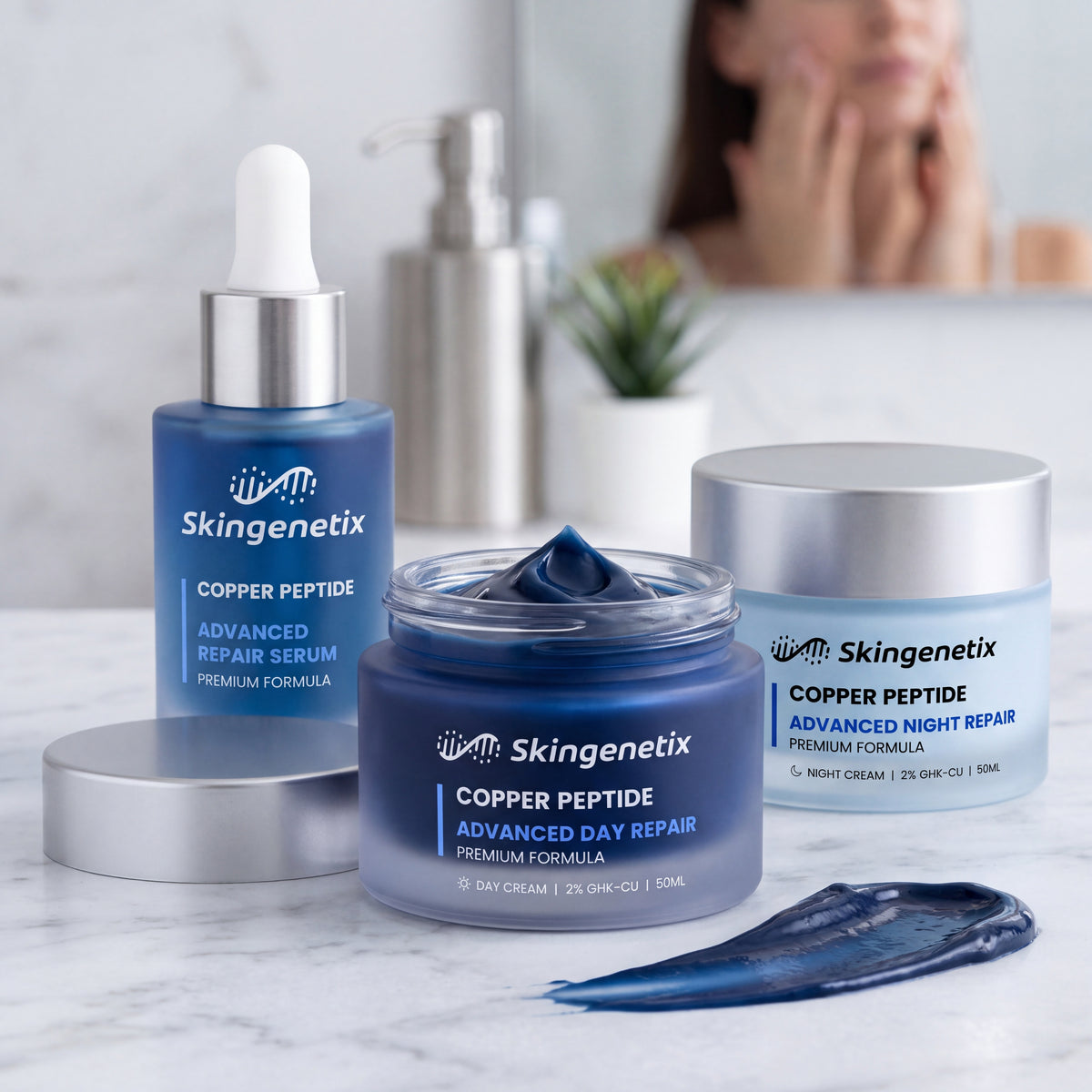 Skingenetix Complete Copper Peptide (GHK-Cu) Day & Night Skincare Routine - the day cream jar open beside the serum and night cream, with a cream swatch
