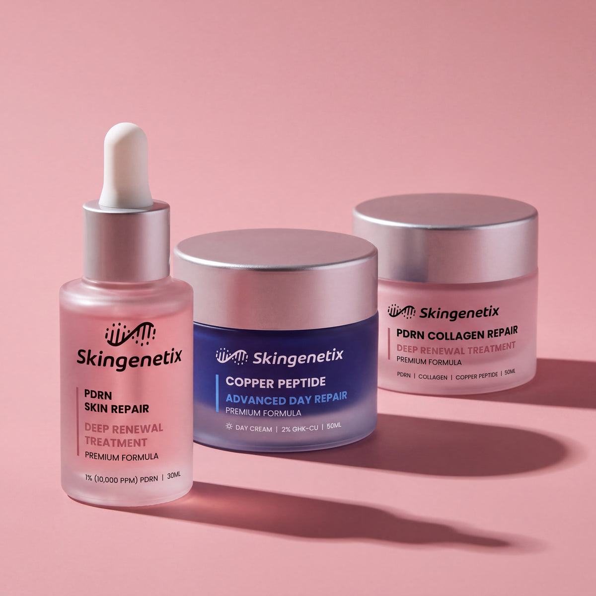 Skingenetix Complete Skin Repair & Renewal Day & Night Routine - the routine on a rose ground under hard directional light